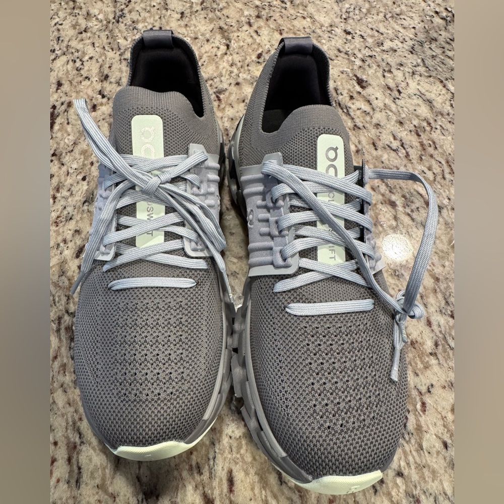 Brand new On. Size 9.5. Cloudswift. Gray and pale blue.